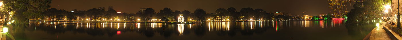 A panoramic view of the Hoan Kiem Lake by night.