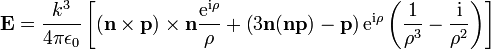 \mathbf E = \frac{k^3}{4\pi \epsilon_0} \left[
    (\mathbf n\times\mathbf p)\times\mathbf n\frac{\mathrm e^{\mathrm i \rho}}{\rho}
    +\left(3\mathbf n(\mathbf n\mathbf p)-\mathbf p\right)
    \mathrm e^{\mathrm i \rho}\left(\frac{1}{\rho^3}-\frac{\mathrm i}{\rho^2}\right)\right]