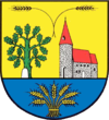 Die Ratekauer Felsteinkirche im Wappen der Gemeinde Ratekau