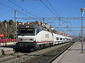 252-053-4 with talgo train at Castelldefels.jpg