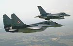 U.S. F-16C Fighting Falcon and Polish Mikoyan-Gurevich MiG-29A over Krzesiny air base, Poland - 20050615.jpg