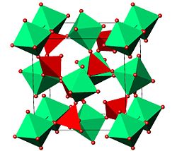 Struktur von Zirconiumwolframat:ZrO6-Oktaeder grün, WO4-Tetraeder und Sauerstoffatome rot
