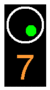 Signal présentant un feu vert et un 7 allumé en dessous