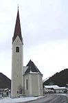 Kath. Expositurkirche zum hl. Josef mit Friedhof, Friedhofskapelle und Kriegergedächtnisstätte